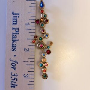 Judith jack lapel pin